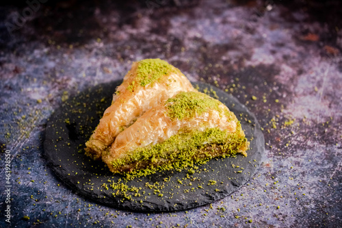 Pistachio Turkish Baklava  Havuc Dilimi. Traditional Turkish Dessert. Walnut, Pistachio Turkish Style Antep Baklava. Baklava from Turkish cuisine. 