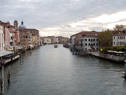 Beautiful view of a grand canal of Venice, Italy with a cityscape photo