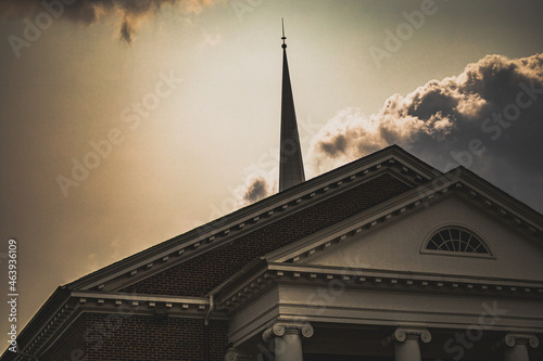 beautiful historic south Atlanta Georgia church with columns and backlit with sun and clouds from steeple, civil rights movement