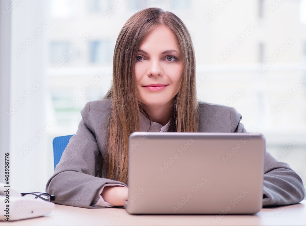 Businesswoman working in the office Businesswoman working in the office