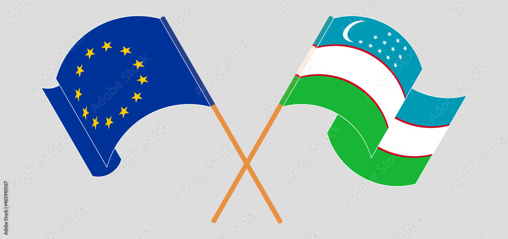 Crossed and waving flags of the European Union and Uzbekistan Crossed and waving flags of the European Union and Uzbekistan