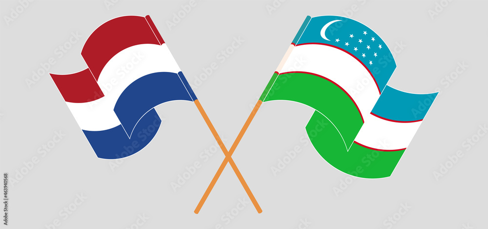 Crossed and waving flags of the Netherlands and Uzbekistan