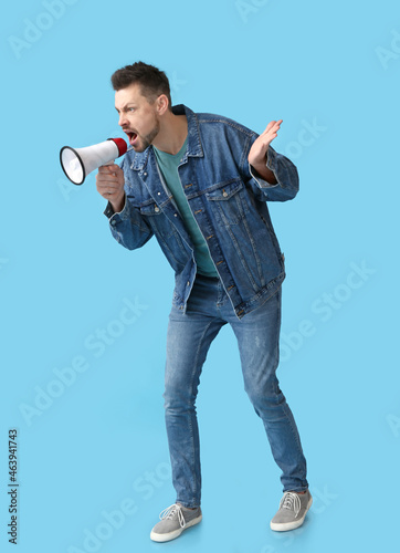 Protesting man with megapho...