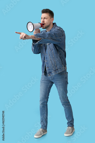 Protesting man with megapho...