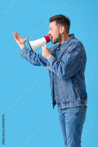 Protesting man with megapho...