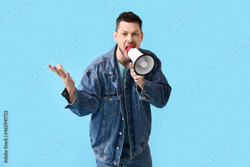 Protesting man with megapho...