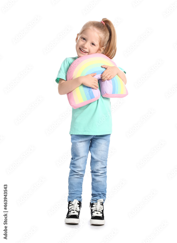 Funny little girl hugging toy rainbow on white background Funny little girl hugging toy rainbow on white background