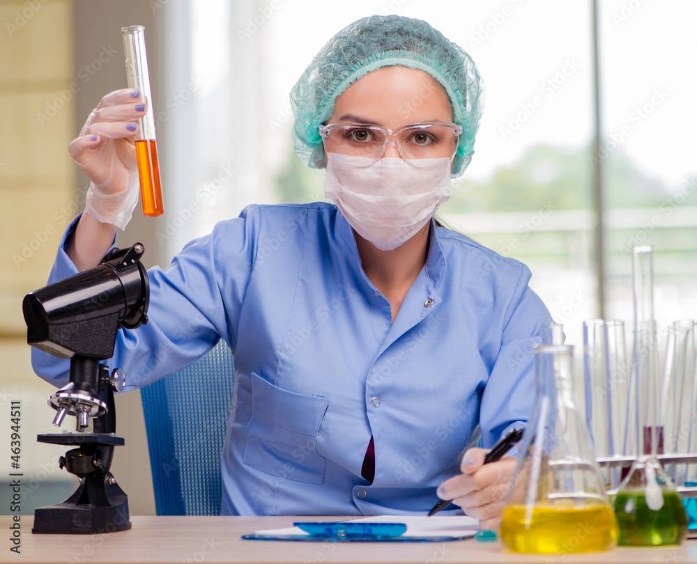 Woman chemist working in the lab Woman chemist working in the lab
