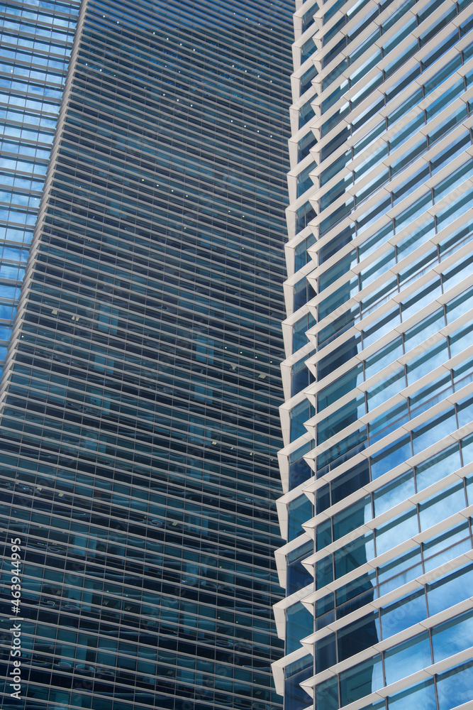 Facade texture of a glass mirrored office building Facade texture of a glass mirrored office building