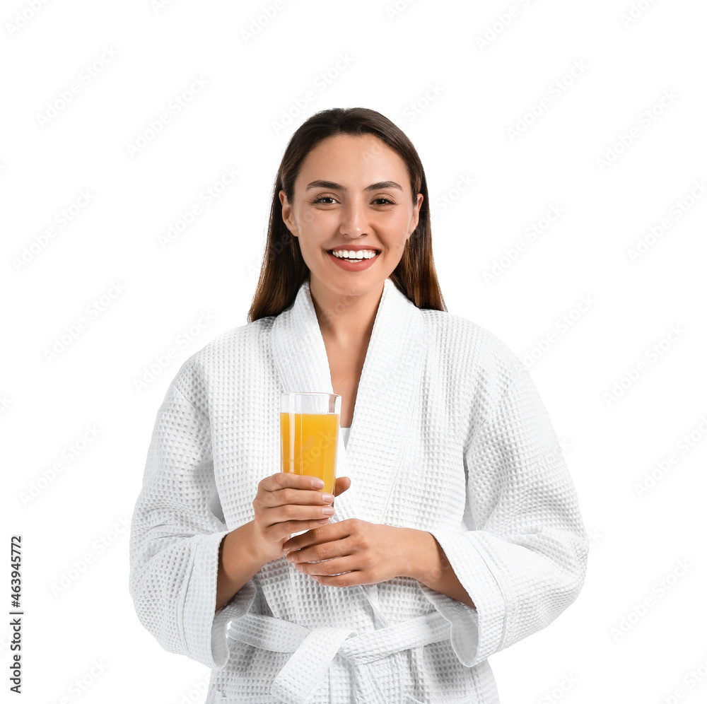 Young woman with glass of orange juice on white background Young woman with glass of orange juice on white background