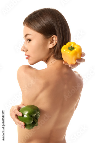 Naked young woman with bell...