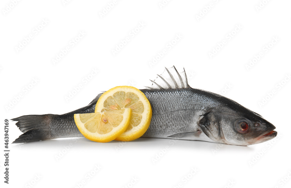 Fresh uncooked sea bass fish with lemon on white background