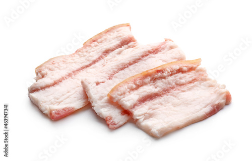 Slices of uncooked bacon on white background