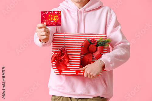 Man with gift card and Chri...