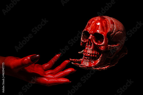 Hand and bloodstained human...