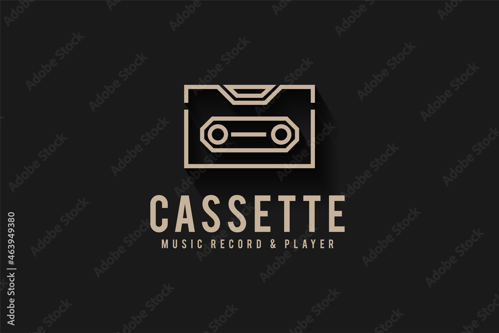 Audio cassette music emblem, lapel, badge or logo in monochrome vintage style isolated on black background Audio cassette music emblem, lapel, badge or logo in monochrome vintage style isolated on black background