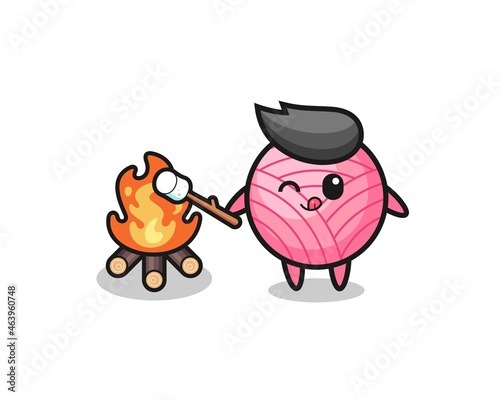 yarn ball character is burning marshmallow