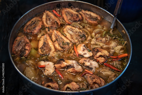 Snake head fish belly with pickle mustard soup. Chinese style