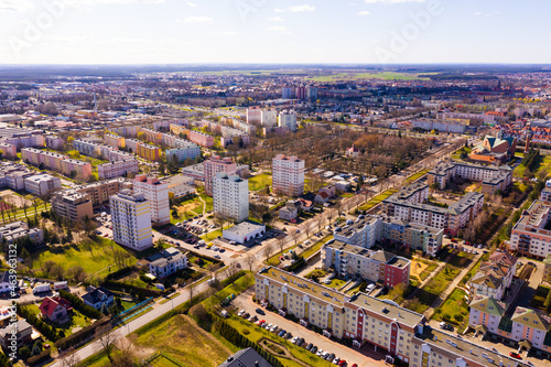 Aerial view of modern residential areas of Polish city of Leszno in sunny spring day