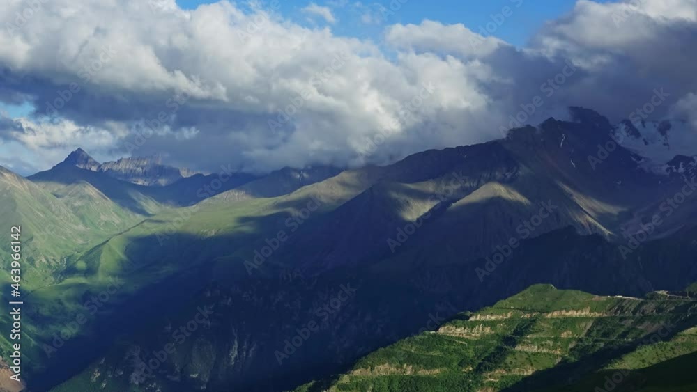 Beautiful summer landscape with rainbow and fast moving clouds in Caucasus Mountains, Russia, timelapse 4k Beautiful summer landscape with rainbow and fast moving clouds in Caucasus Mountains, Russia, timelapse 4k
