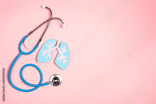 Prevention of pulmonary disease. Lung symbol and stethoscope on a pink background.
