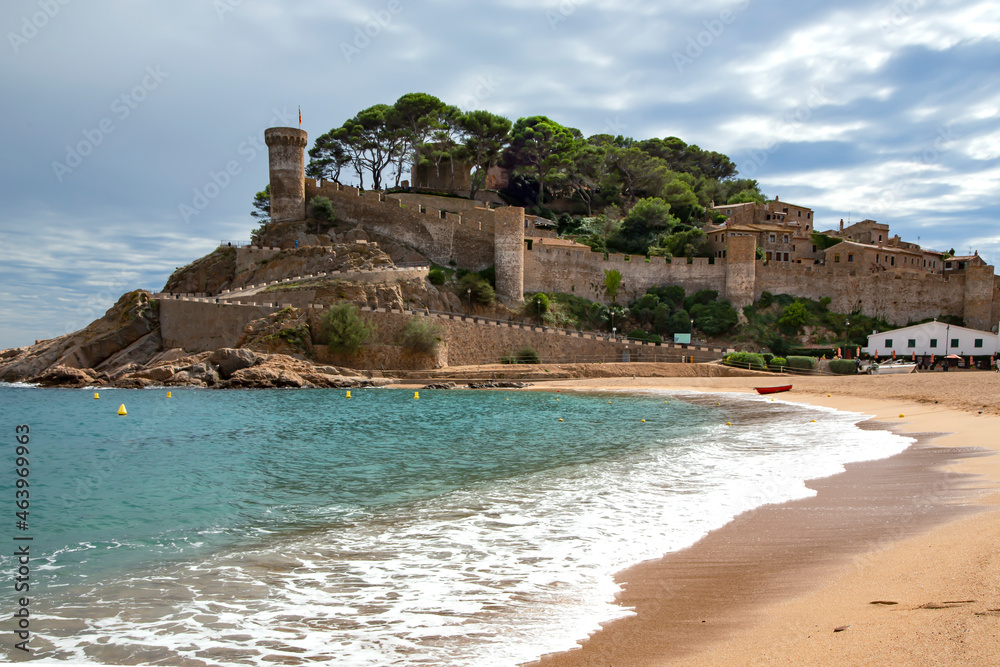 Fortress of Tossa de Mar or Vila Vella is visible from the Gran beach. Tossa de Mar is a complex of medieval buildings enclosed by a defensive wall with watchtowers, which still retains the old struct
