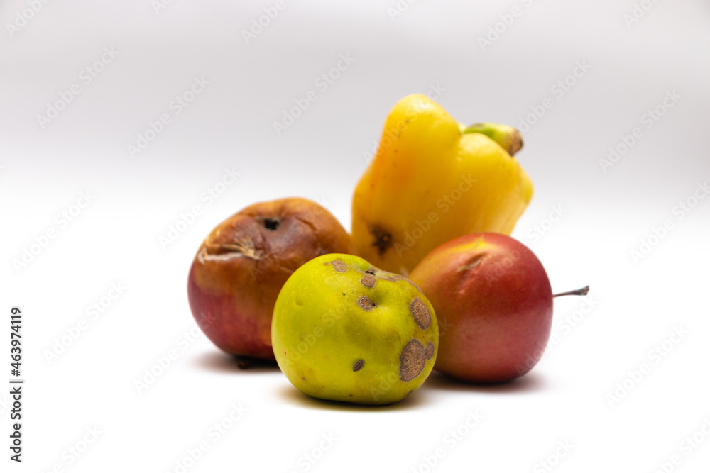 Spoiled food on the white table