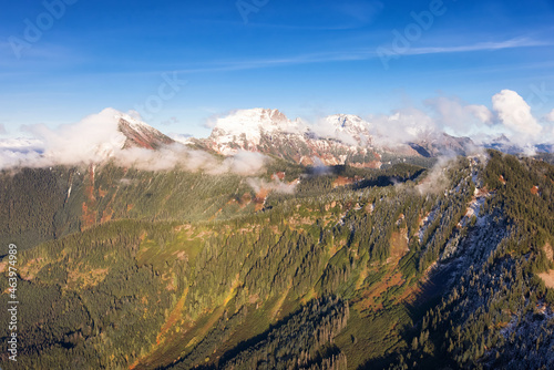 Aerial View of Canadian Rocky Mountains with snow on top during Fall Season. Nature Landscape located near Chilliwack, East of Vancouver, British Columbia, Canada. © edb3_16