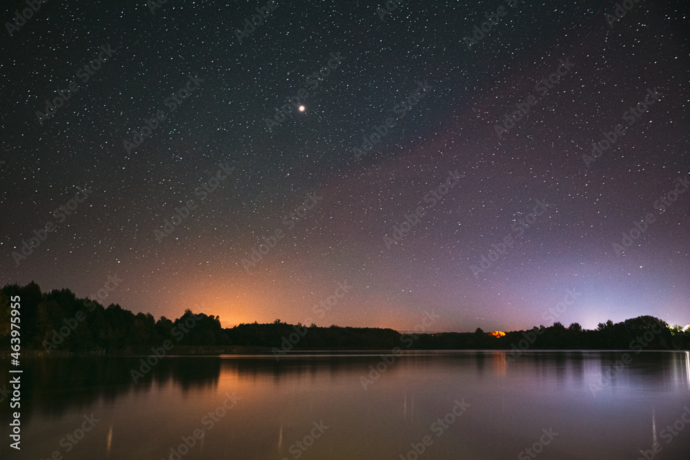 Village Novoye Lyadno, Lyepyel District, Vitebsk Province, Belarus. Real Colorful Night Stars Above Lepel Lake. Natural Starry Sky Background Backdrop Landscape