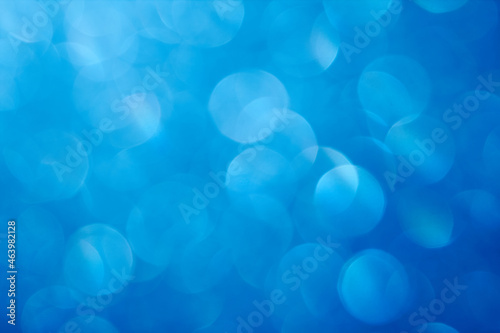 Abstract Blue Bright Bokeh circles, bubbles. The festive kaleidoscope glare. The Sunlight.