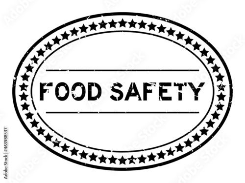 Grunge black food safety word oval rubber seal stamp on white background