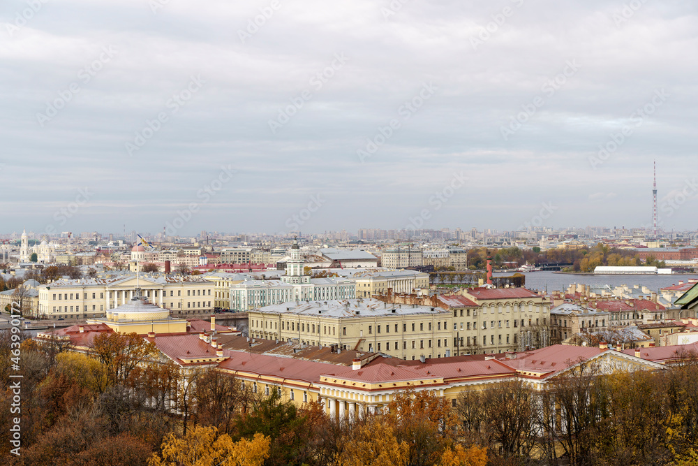 Panorama of St. Petersburg from the background height. View of the rooftops of St. Petersburg in autumn. Points of interest and city center