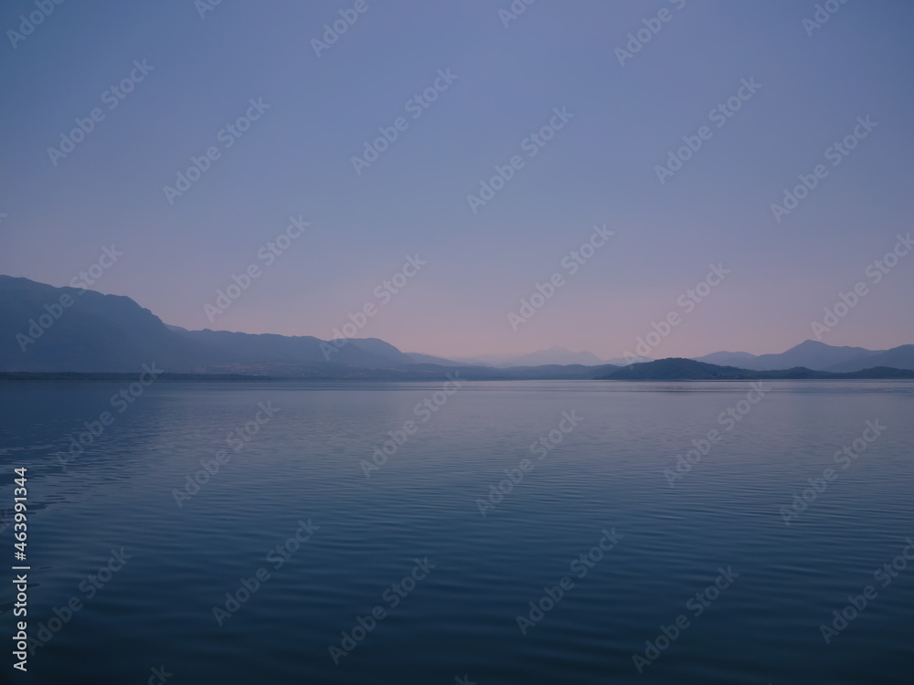 A magical view of a mountain lake before dawn