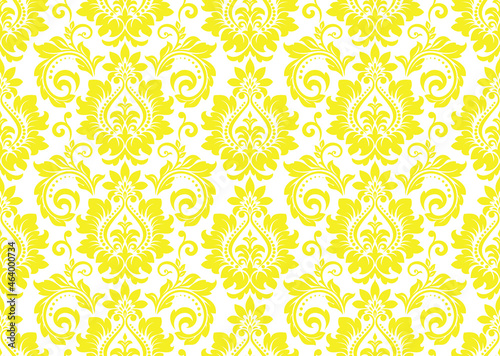 Wallpaper in the style of Baroque. Seamless vector background. White and yellow floral ornament. Graphic pattern for fabric, wallpaper, packaging. Ornate Damask flower ornament