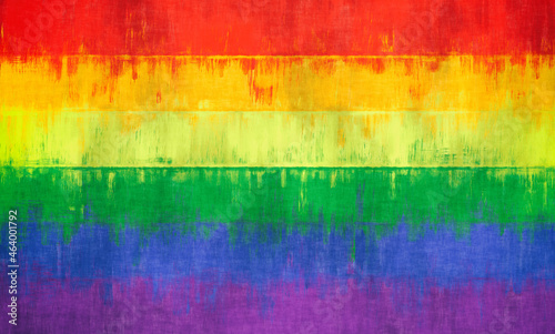 Pride LGBT rainbow color flag painted on a stone wall background
