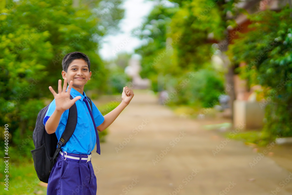 indian little boy asking for lift going to school
