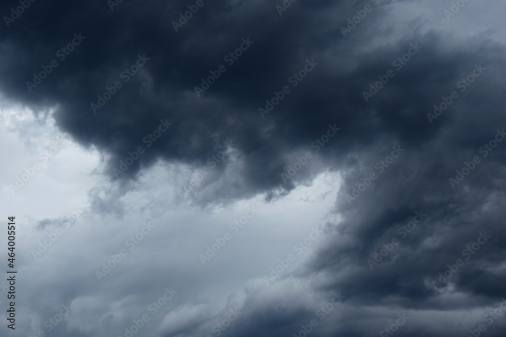 Dark grey threatening thunderclouds, rain clouds in the dark sky, weather change, summer thunderstorms, thunderclouds and rain clouds dark and grey, grey sky Dark grey threatening thunderclouds, rain clouds in the dark sky, weather change, summer thunderstorms, thunderclouds and rain clouds dark and grey, grey sky