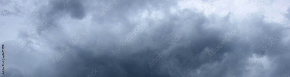 Dark grey threatening thunderclouds, rain clouds in the dark sky, weather change, summer thunderstorms, thunderclouds and rain clouds dark and grey, grey sky Dark grey threatening thunderclouds, rain clouds in the dark sky, weather change, summer thunderstorms, thunderclouds and rain clouds dark and grey, grey sky