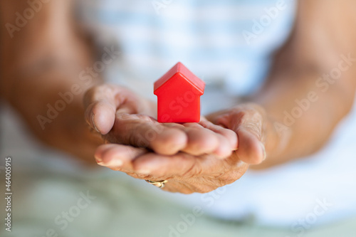Elderly woman and her property photo