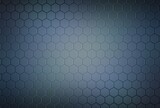 Dark hexagonal mosaic empty wall geometric pattern. Textured background black color with blue sheen.
