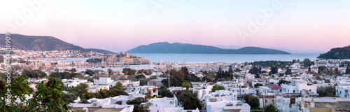 Panoramic shot of bodrum castle when at sunset Bodrum, Mugla, Turkey. Tourism and leisure concept. photo