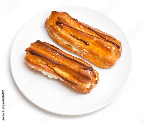 two eclairs on a white plate