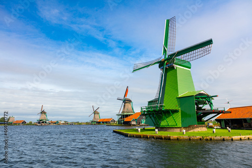 Famous Dutch village with windmills, Agricultural historical landscape. Tourism. Popular Holland, Netherlands, Europe.