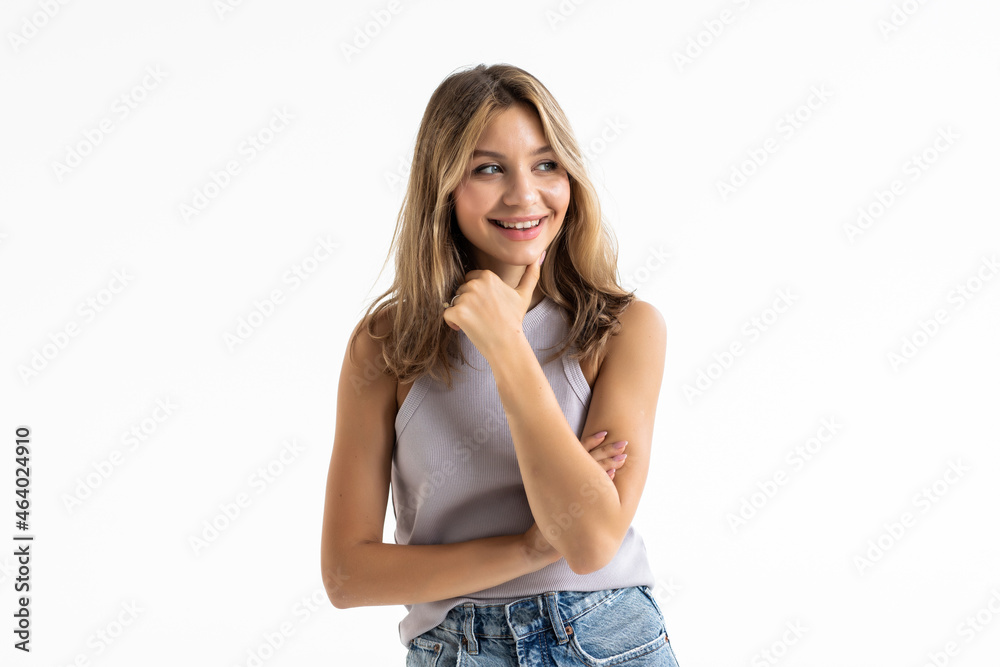Young pretty woman posing and smiling over white background Young pretty woman posing and smiling over white background