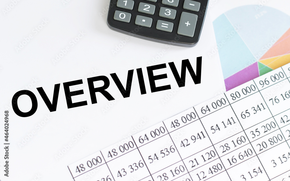text OVERVIEW on white notepad among reports on the table text OVERVIEW on white notepad among reports on the table