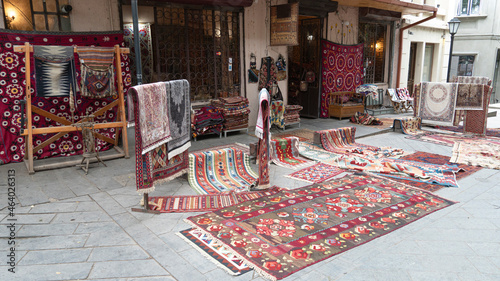 handmade carpets are sold on the street. street trade