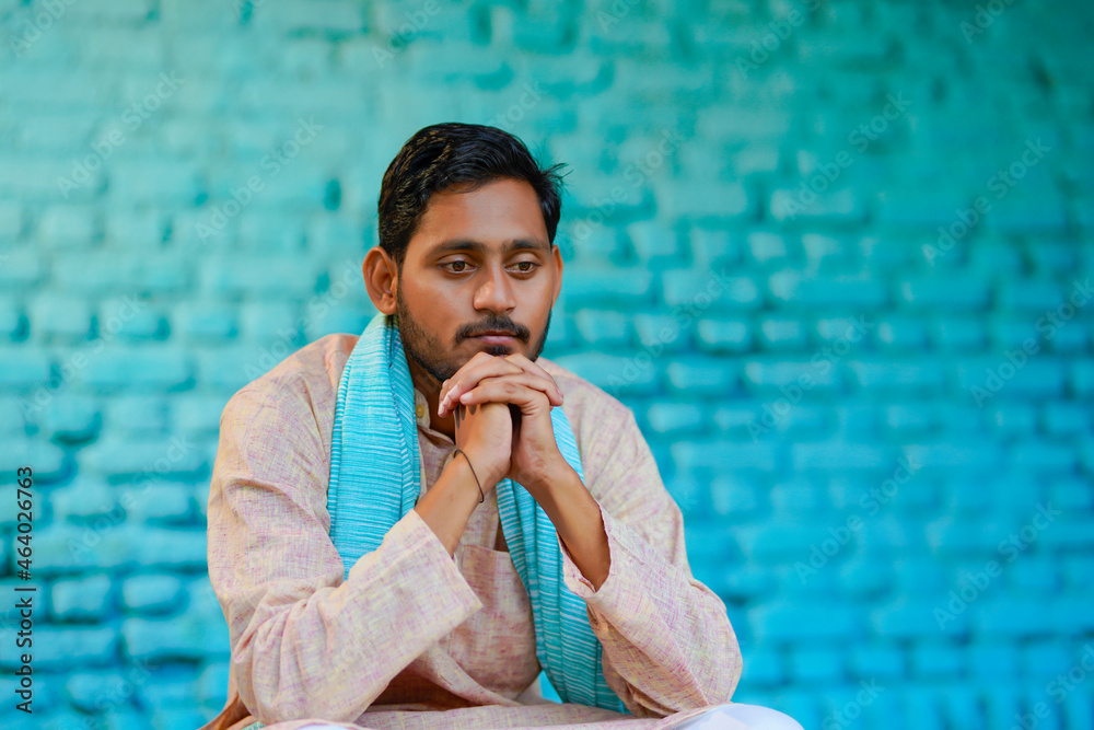 Young indian farmer in depression. Stock Photo | Adobe Stock