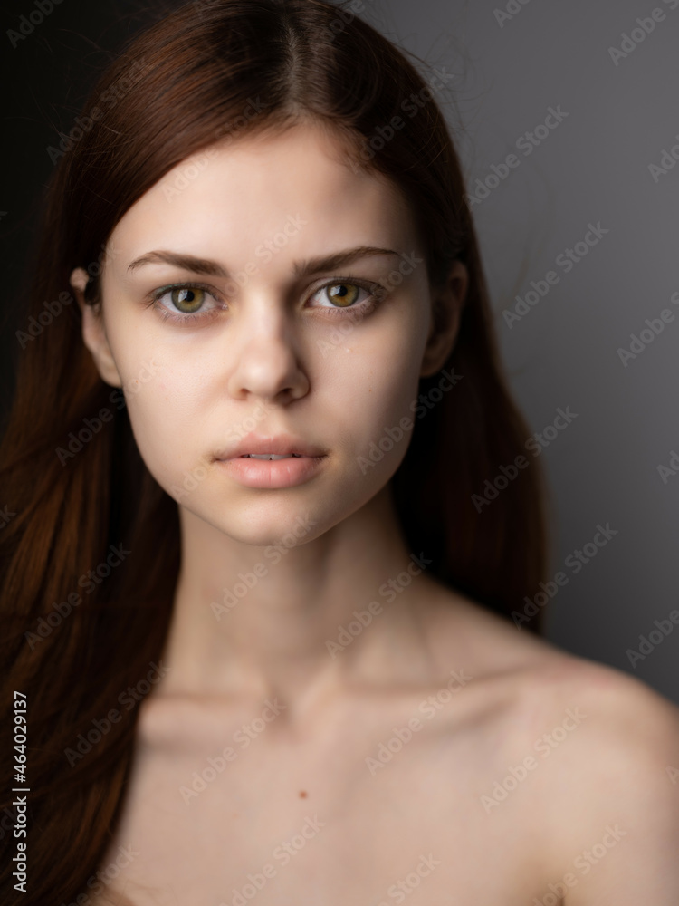 Fototapeta premium beautiful woman hairstyle bare shoulders clear skin Lifestyle Studio