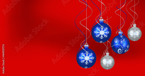 Image of christmas baubles over red background
