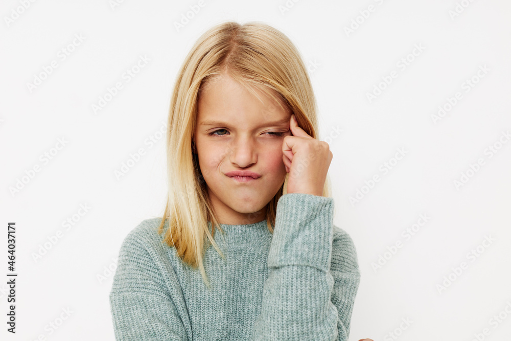 emotional girl fashionable baby clothes posing studio emotional girl fashionable baby clothes posing studio